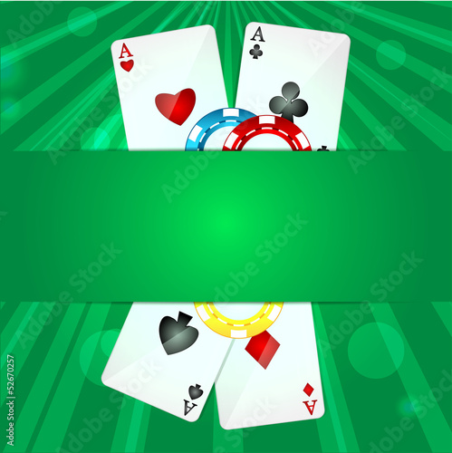 playing cards and poker chips on a green background