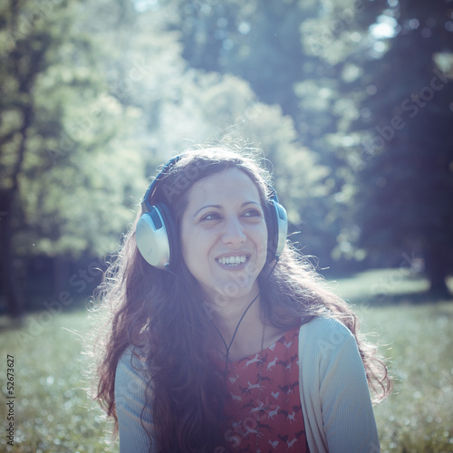 Quadro em tela vintage hipster eastern woman with headphones