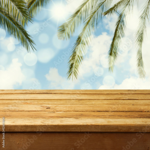 Summer background with empty wooden table