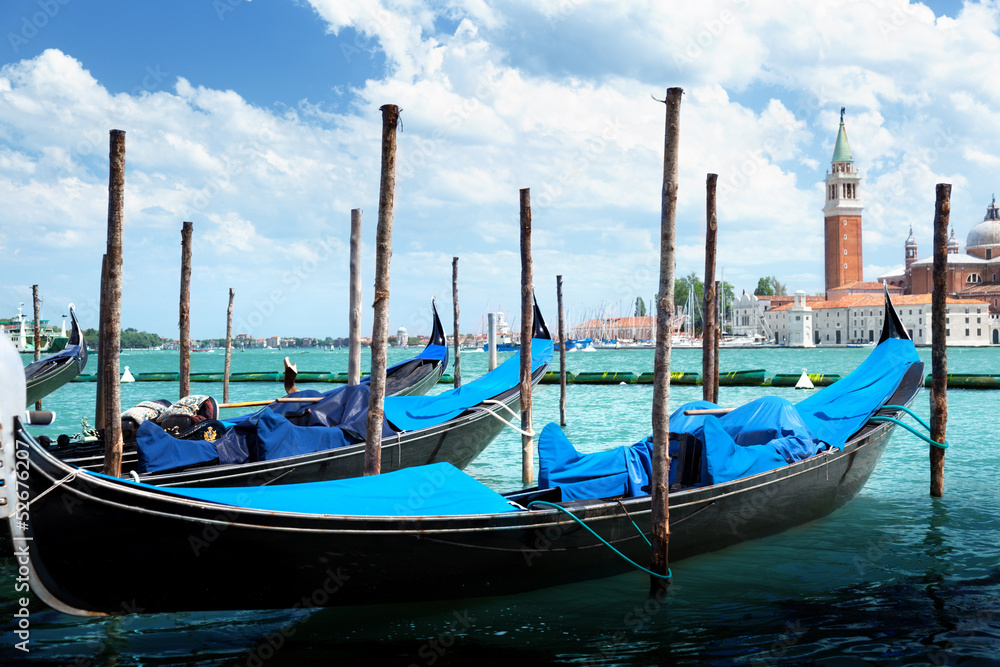 Gondolas on Grand Canal and San Giorgio Maggiore church in Venic Gondolas on Grand Canal and San Giorgio Maggiore church in Venic