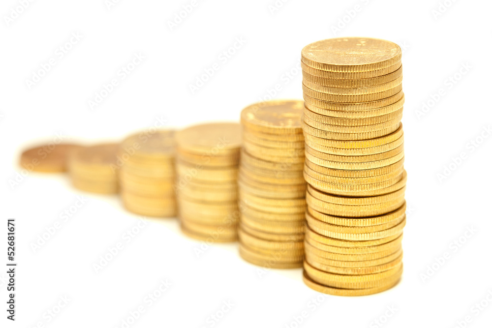 Columns of golden coins isolated on white Columns of golden coins isolated on white