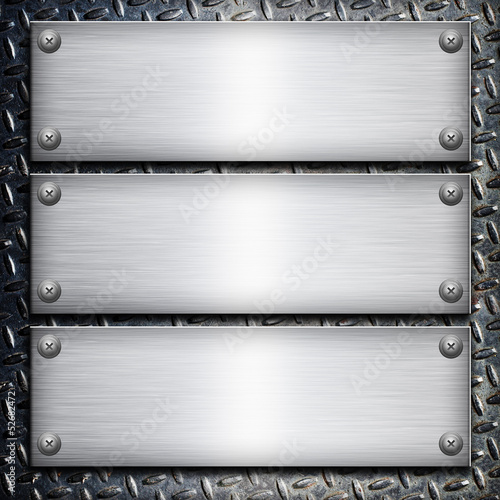 Brushed steel plate over black metall background for your design