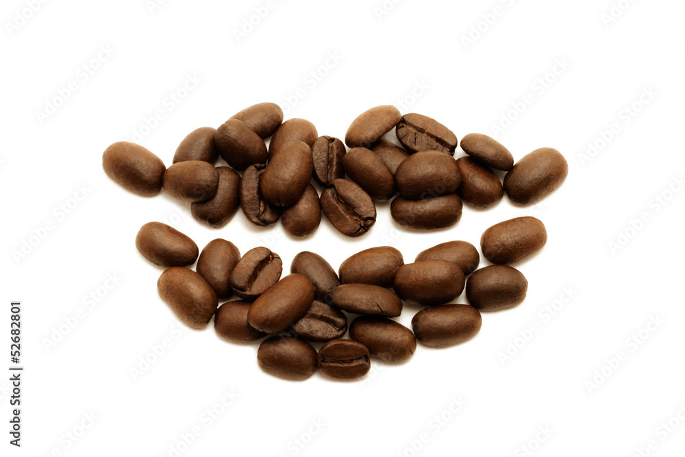 Smile. Coffee beans lying in the shape of lips Smile. Coffee beans lying in the shape of lips