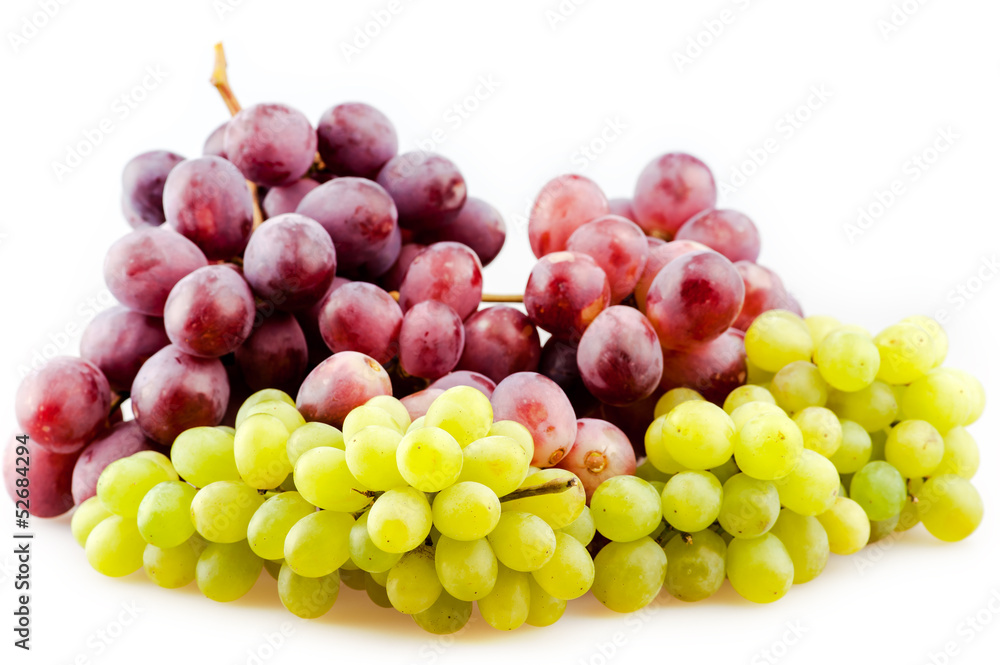 bunch of ripe grapes of different varieties