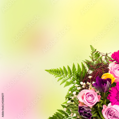 bouquet of colorful flowers over blurred background