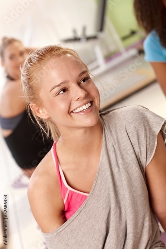 Portrait of beautiful athletic girl smiling