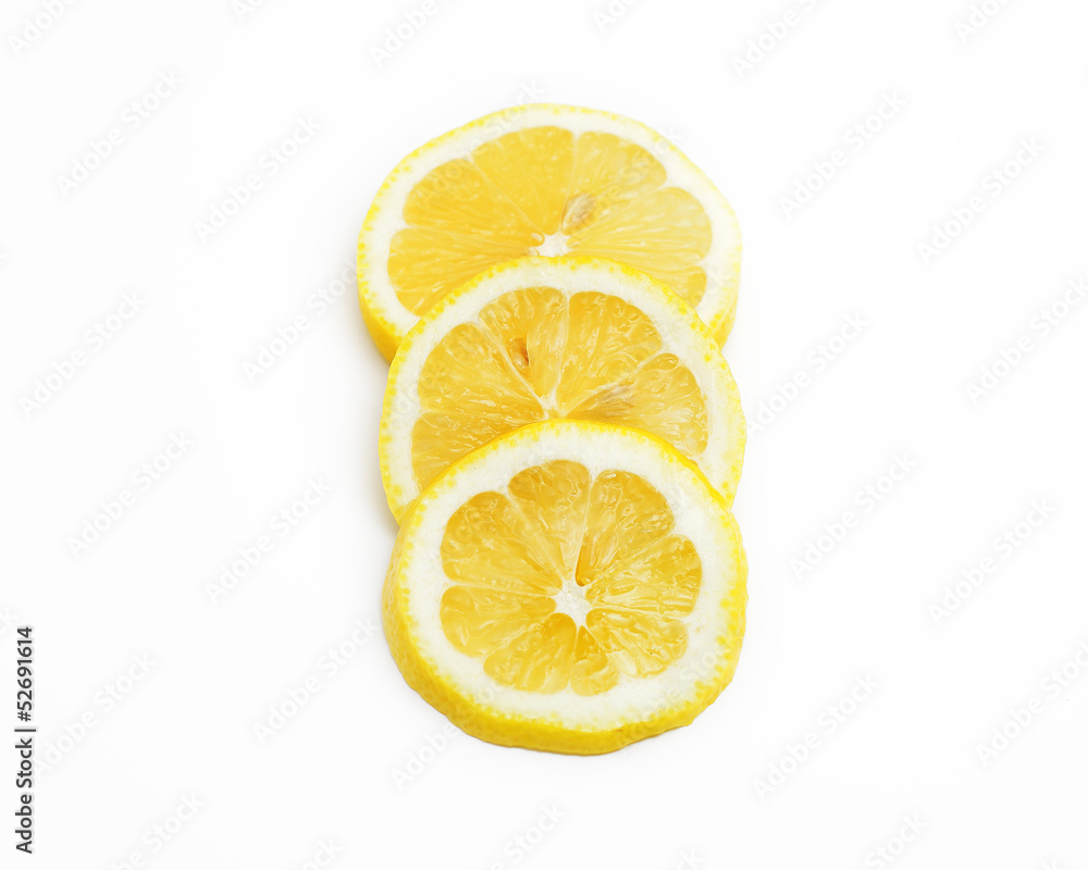 Slices of lemon fruit on white background