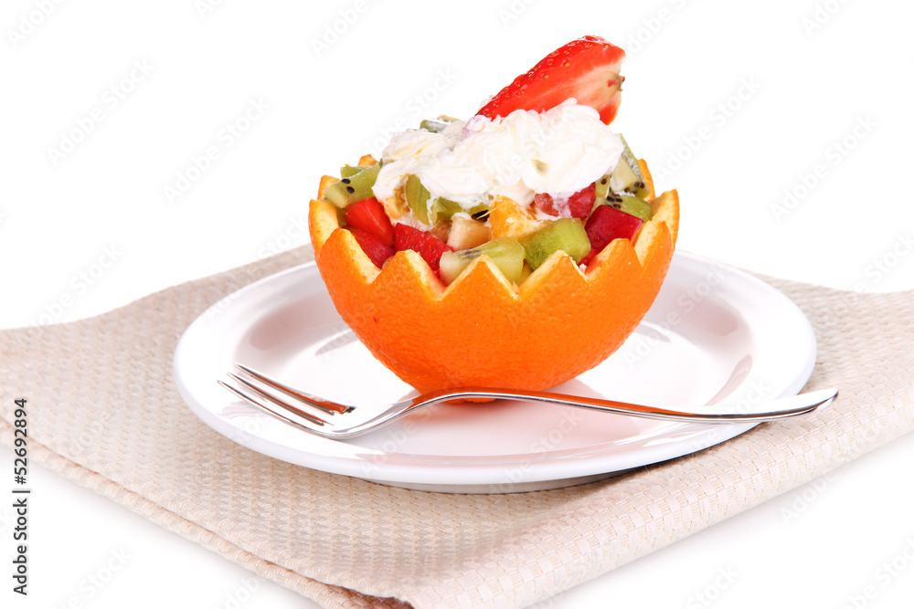 Fruit salad in hollowed-out orange isolated on white Fruit salad in hollowed-out orange isolated on white