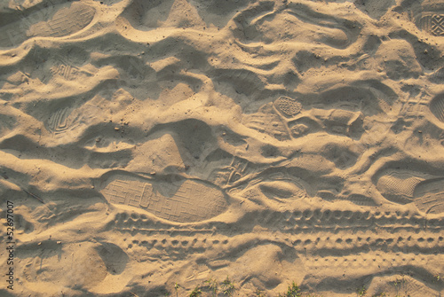 Closeup sand with footprints