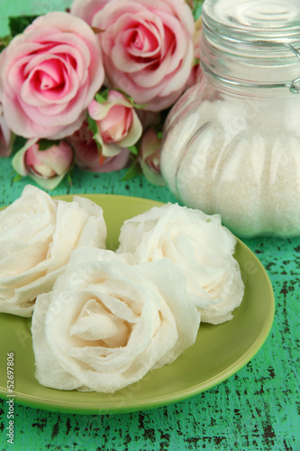 Sugar roses and natural roses  glass jar with sugar 