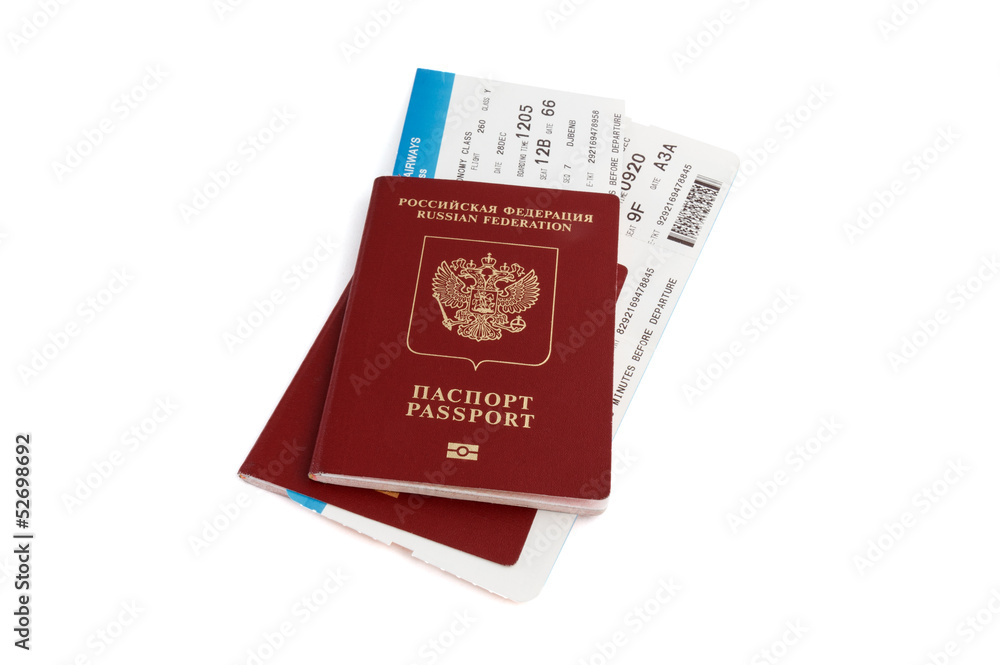 Two isolated Russian passports with boarding passes Two isolated Russian passports with boarding passes
