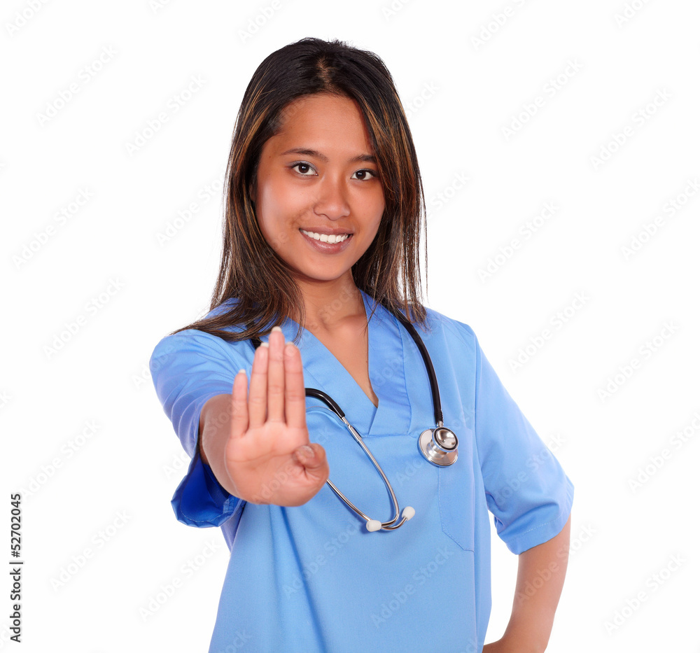 Charming ethnic nurse woman giving the high Charming ethnic nurse woman giving the high