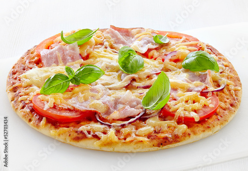Pizza with bacon and tomato