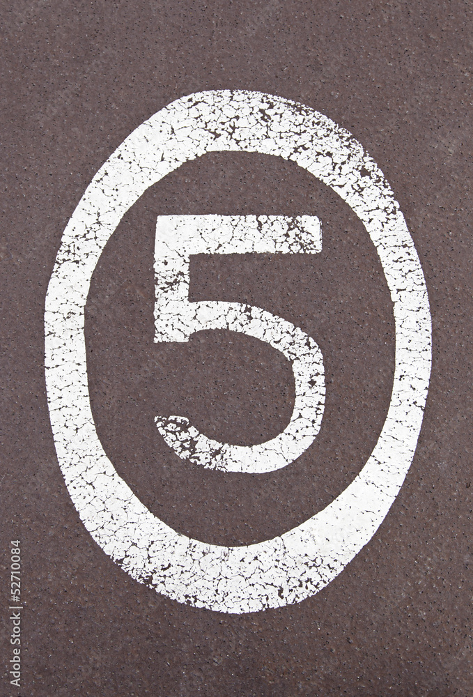 Fototapeta premium Number five painted on the ground