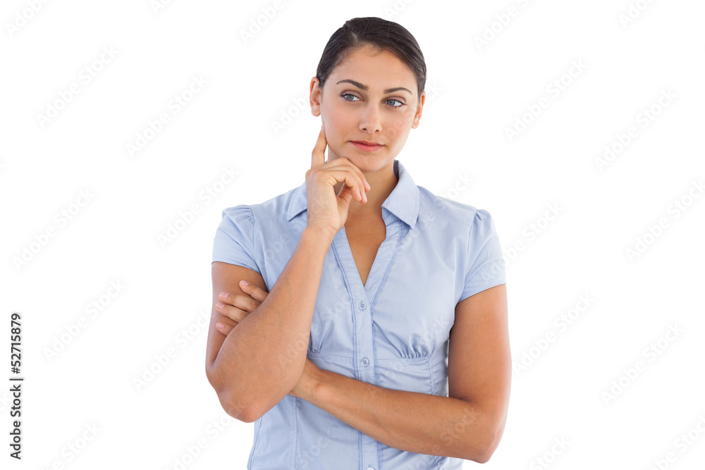 Serious businesswoman with her hand touching her face Serious businesswoman with her hand touching her face