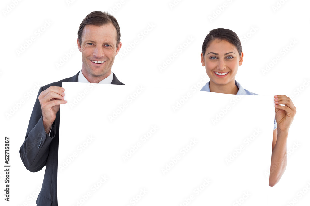 Co workers holding a blank copy space Co workers holding a blank copy space