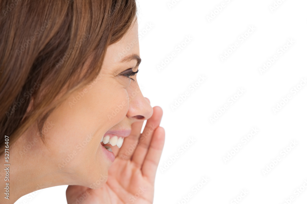 Side view of a woman whispering a secret Side view of a woman whispering a secret