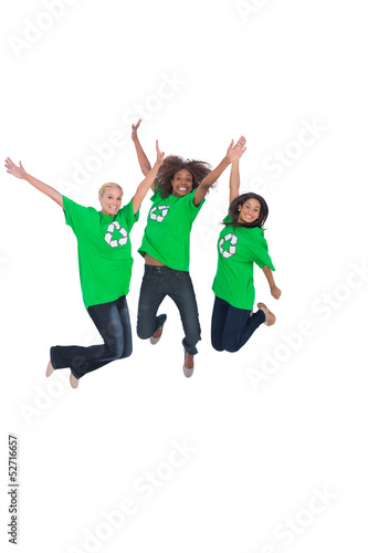 Enviromental activists jumping and smiling