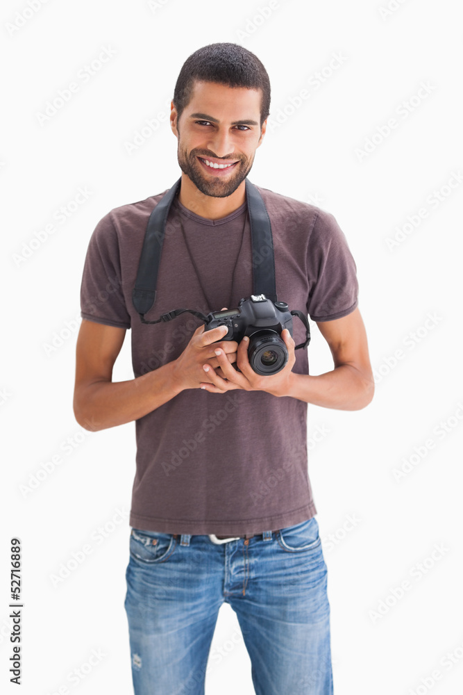 Happy man with camera around his neck Happy man with camera around his neck