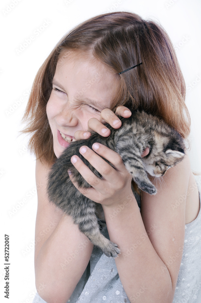 child and kitten child and kitten