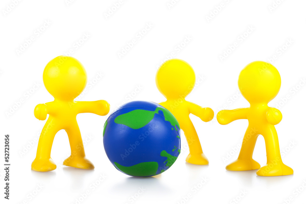 toy little men hold globe. It is isolated toy little men hold globe. It is isolated