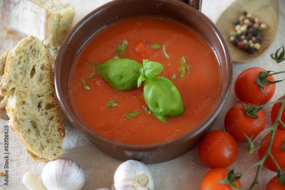 Tomatensüppchen mit Ciabattabrot und Zutaten Stock Photo | Adobe Stock