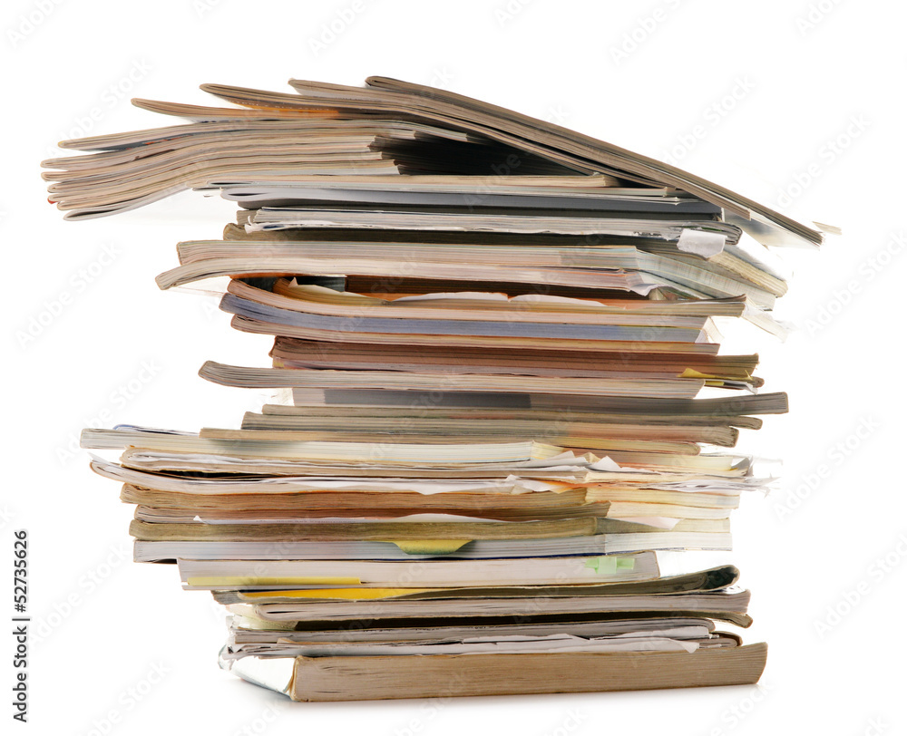 Stack of old magazines isolated on white. Paper recycling Stack of old magazines isolated on white. Paper recycling