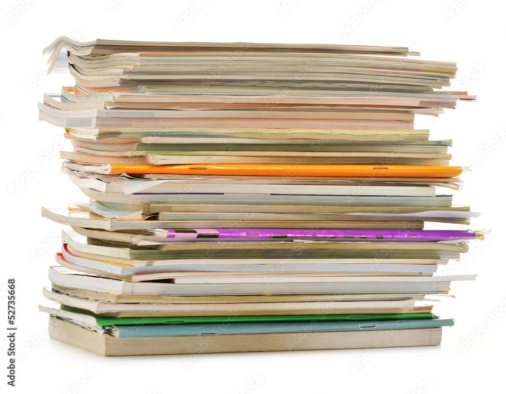 Stack of old magazines isolated on white. Paper recycling Stack of old magazines isolated on white. Paper recycling