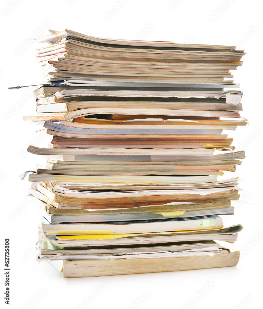 Stack of old magazines isolated on white. Paper recycling Stack of old magazines isolated on white. Paper recycling