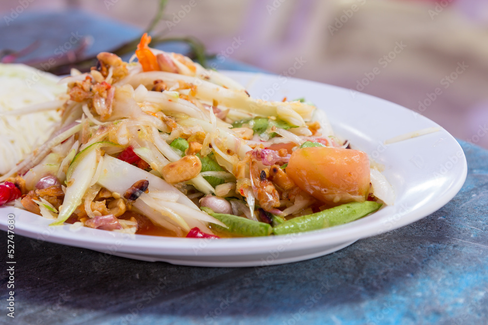 Papaya salad on table of thai food Papaya salad on table of thai food