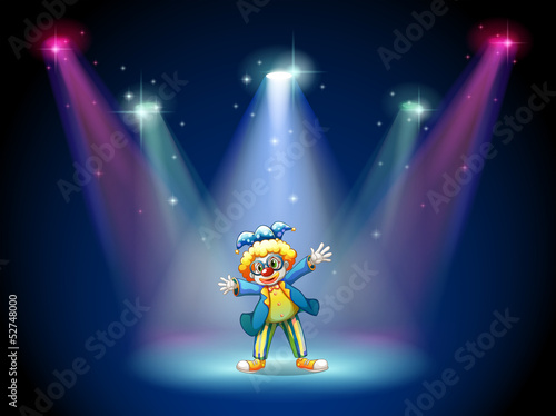 A man dressing up as a clown at the stage
