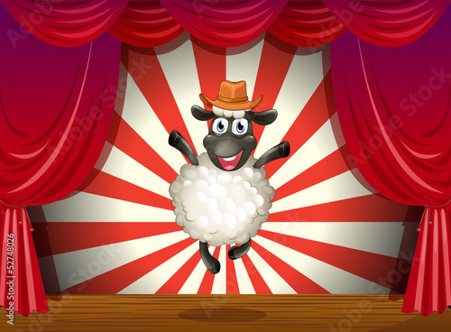 A stage with a sheep jumping at the center