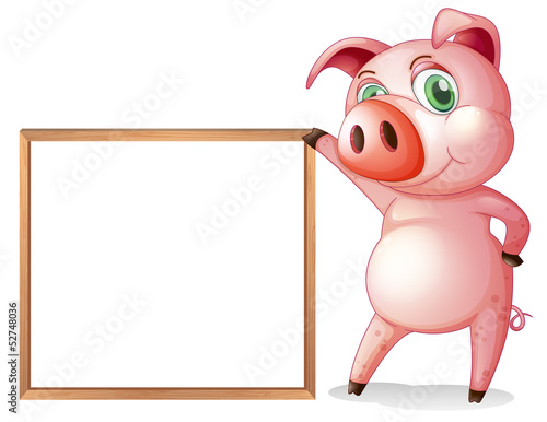 A female pig beside an empty wooden frame