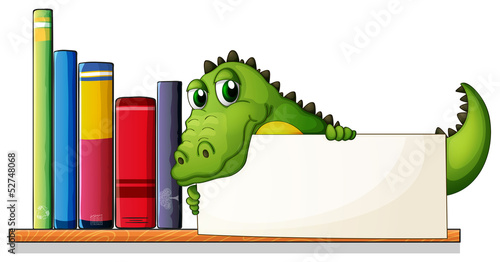 A crocodile holding an empty board above the wooden shelf with b