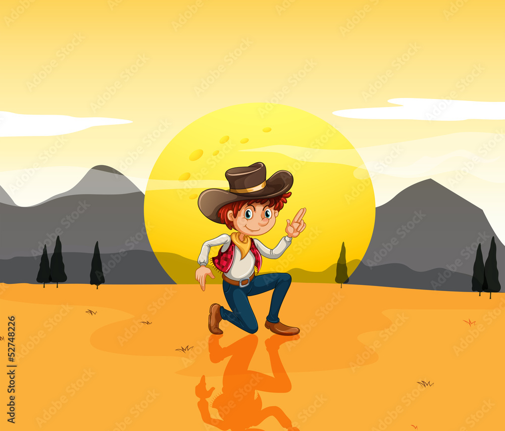 A boy with a hat at the desert