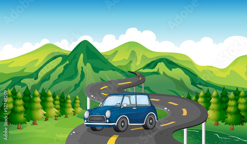 A blue car and the winding road