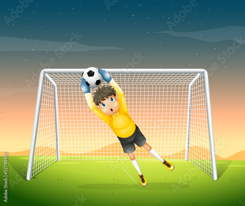 A young football player in his yellow uniform