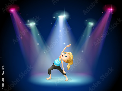 A girl exercising at the center of the stage