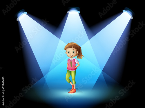 A stage with a young woman at the center