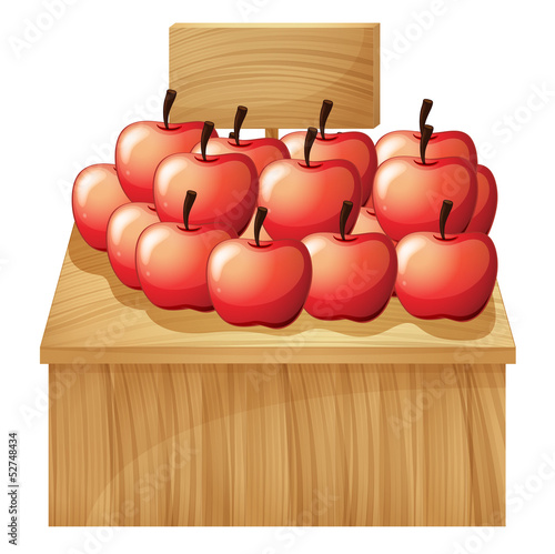An apple fruitstand with an empty signage