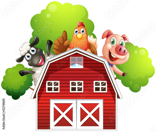 A barn with animals at the rooftop