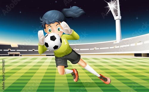 A young lady playing soccer
