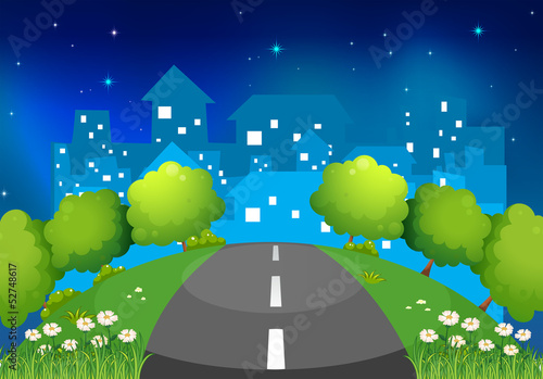A road at the hill with flowers and trees