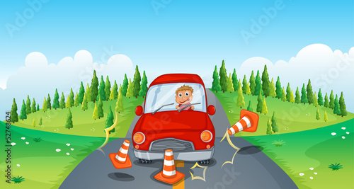 A red car at the road bumping the traffic cones