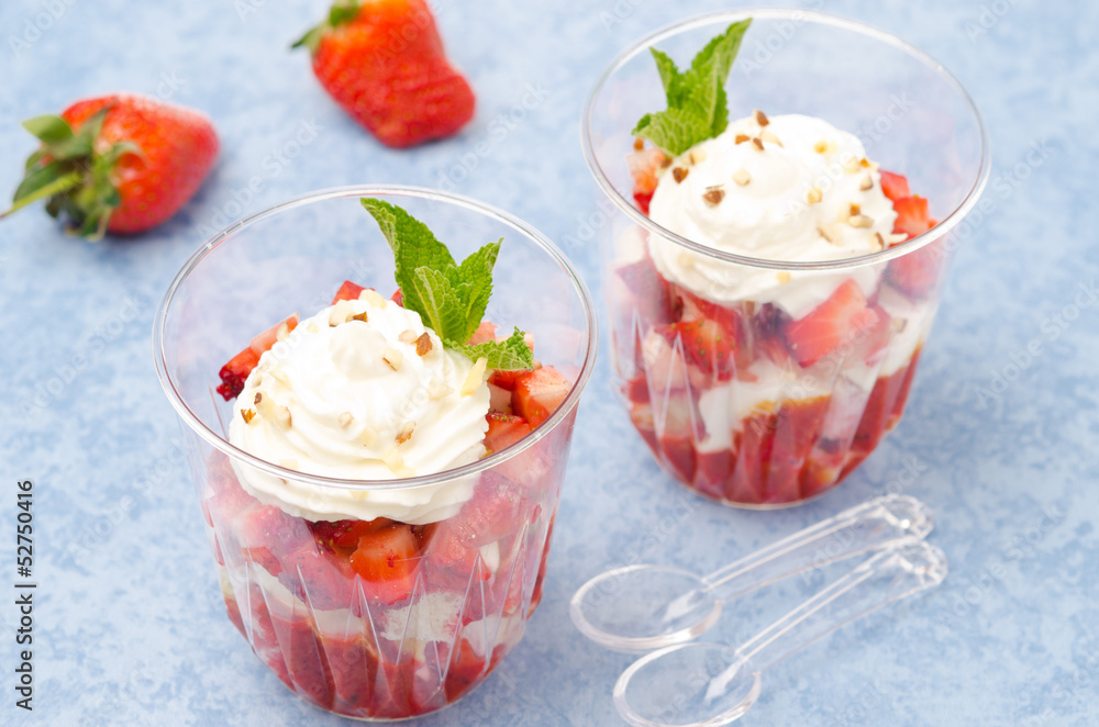 dessert with cookies, berry puree, strawberries and cream dessert with cookies, berry puree, strawberries and cream