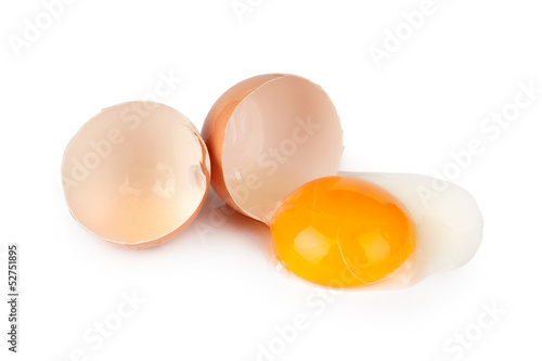 Broken raw egg isolated on white background