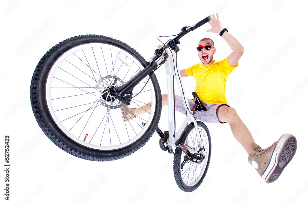 crazy boy on a dirt jump bike isolated on white - wide shot crazy boy on a dirt jump bike isolated on white - wide shot