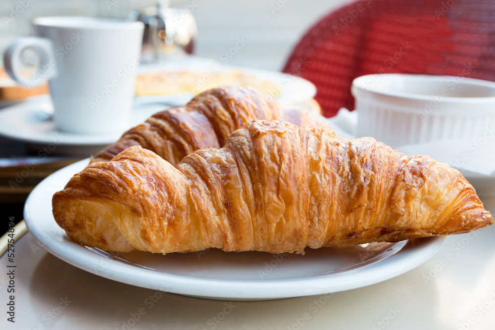 Breakfast with coffee and croissants Breakfast with coffee and croissants