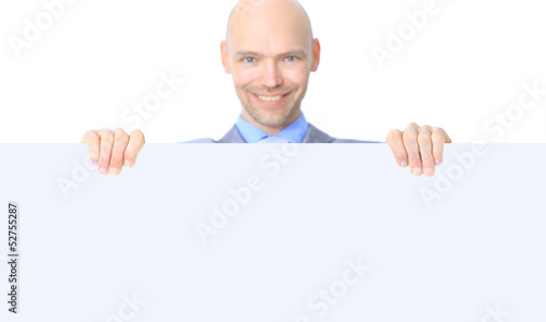 Nice businessman holds white poster.
