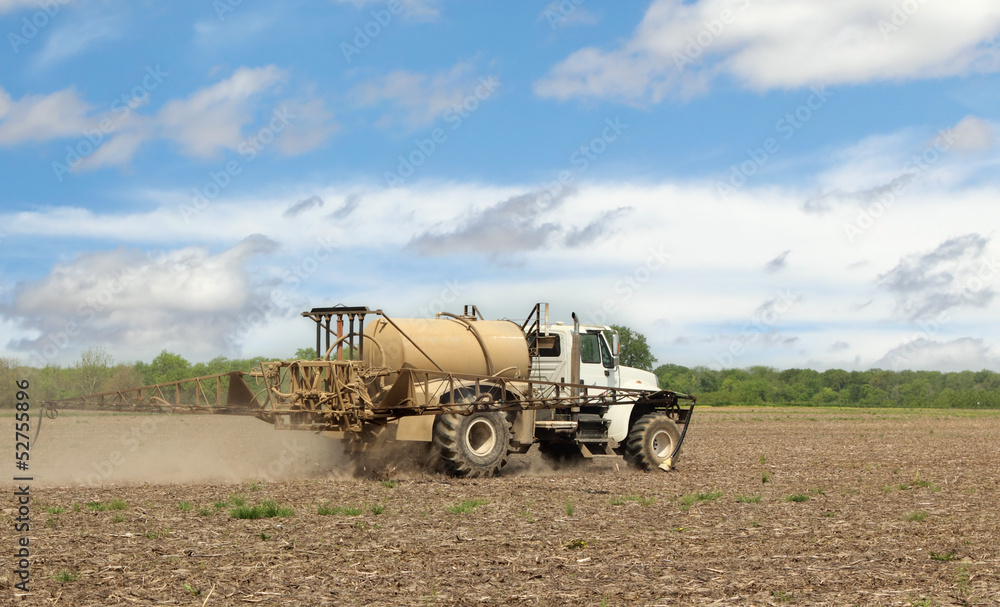 Fototapeta premium Spraying Farm Field